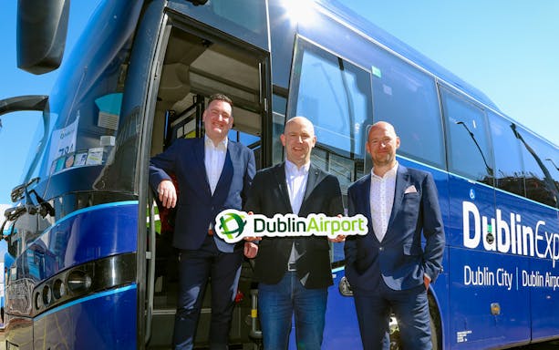 Dublin Express bus with Dublin Airport sign, offering one-way tickets between Belfast and Dublin Airport.