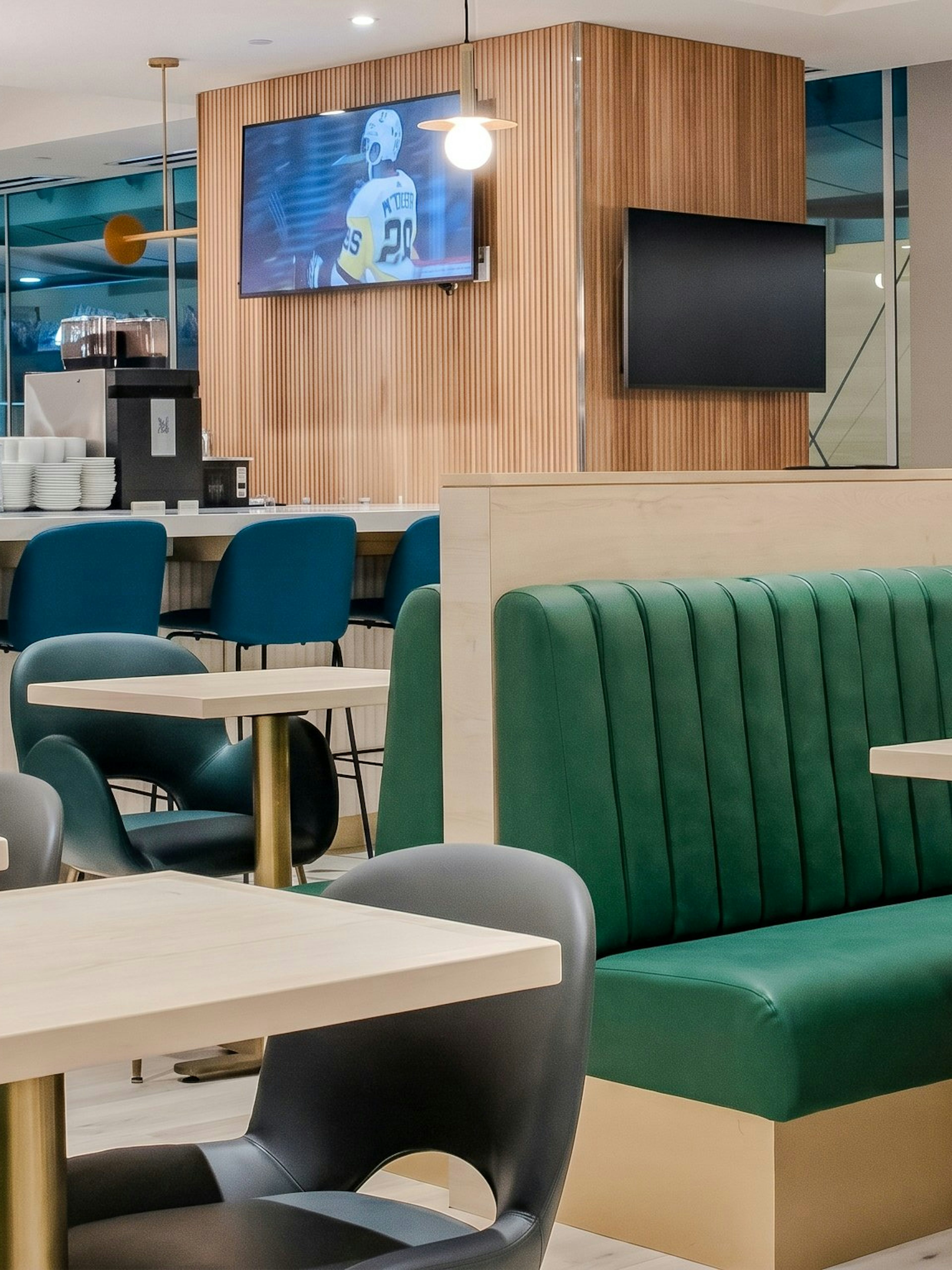 Plaza Premium Lounge seating area with bar at Vancouver International Airport (YVR).