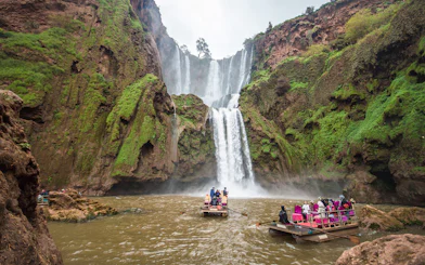 Boat ride approaching Ouzoud waterfalls in Morocco.