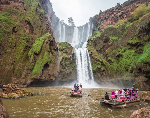 Boat ride approaching Ouzoud waterfalls in Morocco.