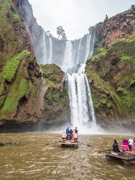 Boat ride approaching Ouzoud waterfalls in Morocco.