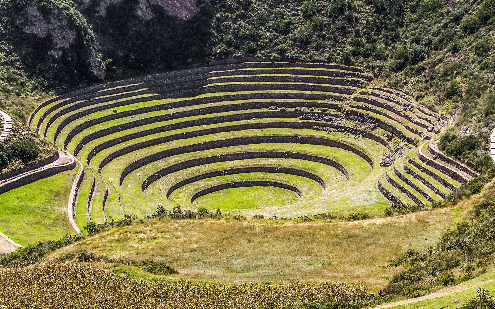 Terraced circular depressions at Moray Archaeological Site, Sacred Valley, near Cusco, Peru.
