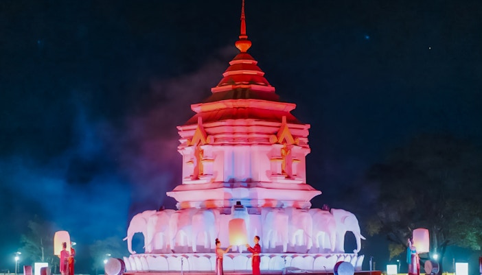 Yipeng Lantern Festival in Chiang Mai with floating lanterns illuminating the night sky.