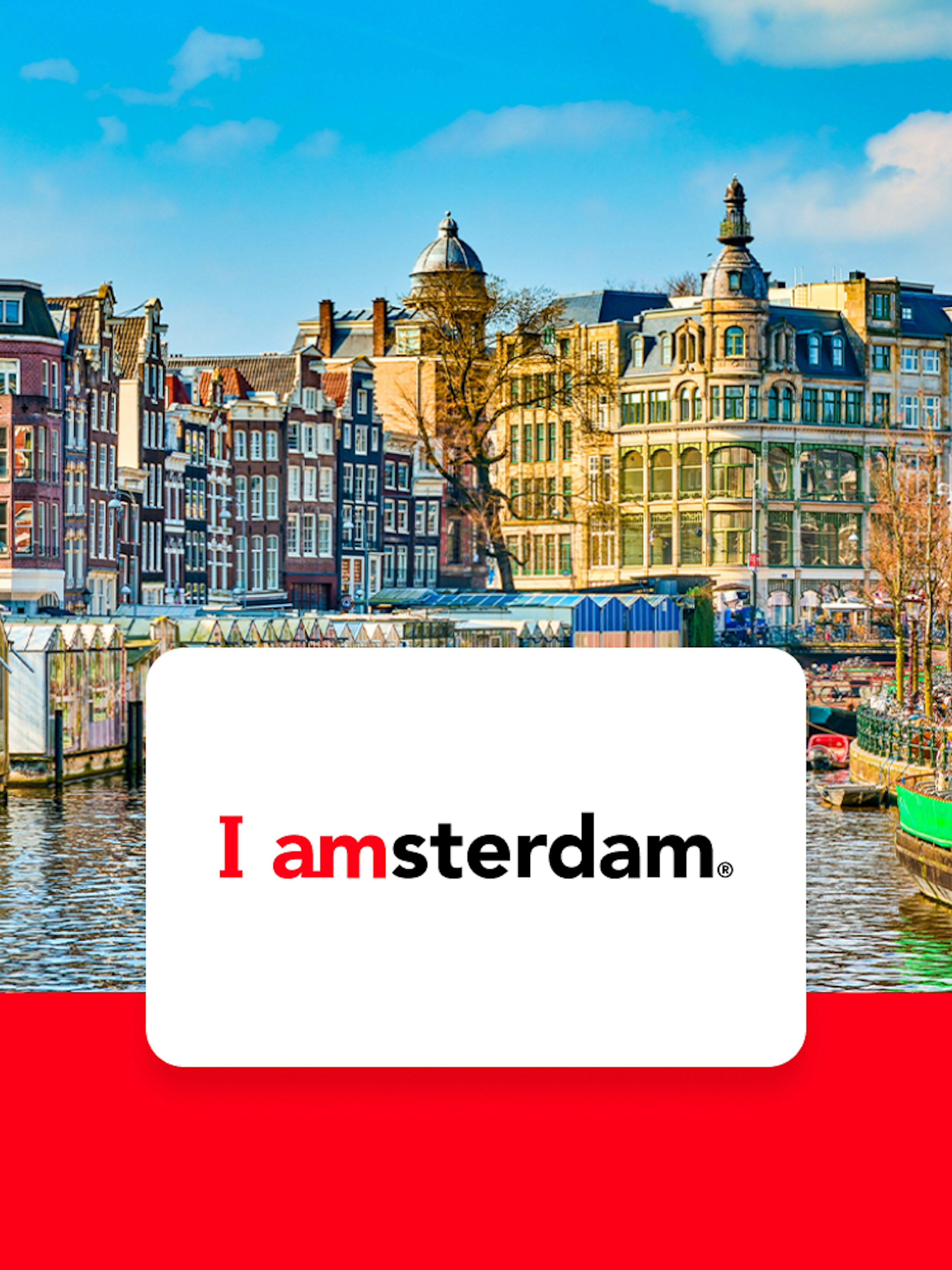 Amsterdam canal with historic buildings and bicycles in early spring.