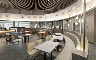 Plaza Premium Lounge seating area in Terminal 1, Leonardo da Vinci-Fiumicino Airport.