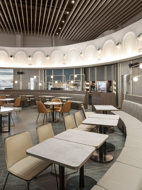 Plaza Premium Lounge seating area in Terminal 1, Leonardo da Vinci-Fiumicino Airport.