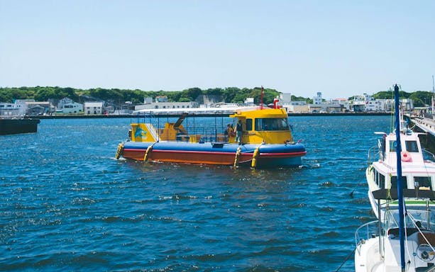 Colorful boat on Misaki port during Keikyu Line day trip.