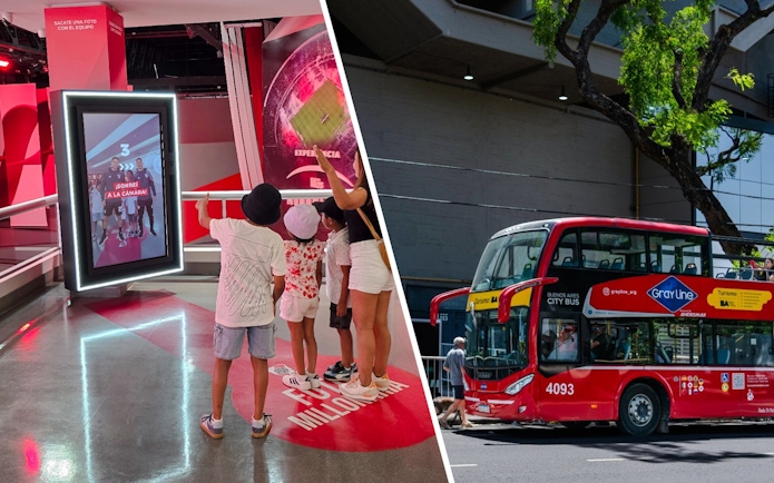 Visitors interacting with a digital display at Museo River in Buenos Aires, with a city tour bus nearby.