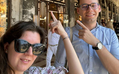 Visitors enjoying a self-guided city exploration game in Venice.