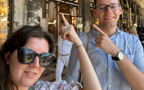 Visitors enjoying a self-guided city exploration game in Venice.