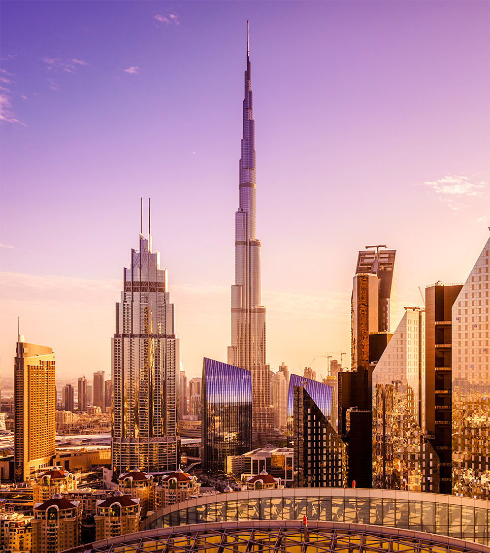 View from Burj Khalifa observation deck overlooking Dubai cityscape.