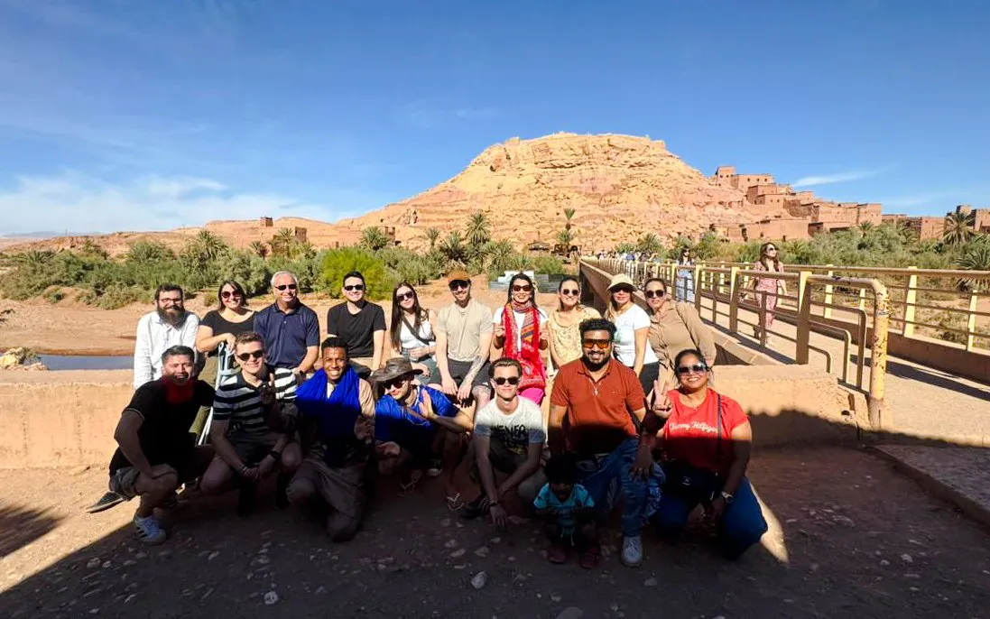 Group of tourists at Ait Benhaddou, Morocco, during 3 Days Desert Tour to Merzouga Dunes.