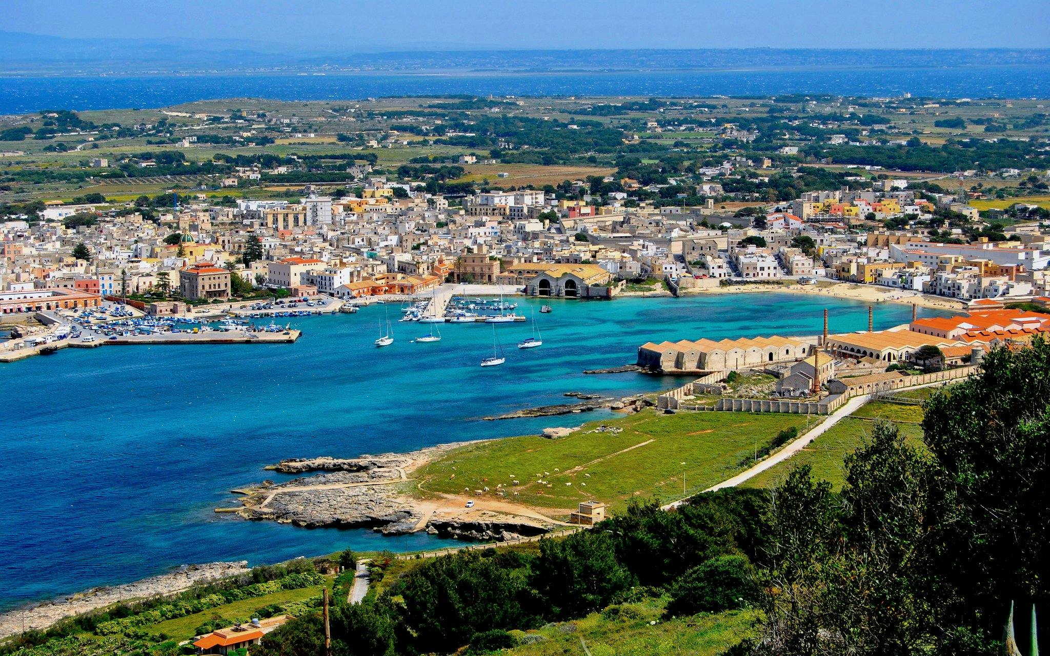 Favignana island view with harbor and boats, part of the Marsala to Levanzo boat tour.