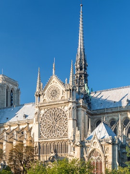 Notre Dame Cathedral facade with intricate rose window, Paris.