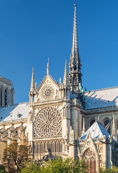 Notre Dame Cathedral facade with intricate rose window, Paris.