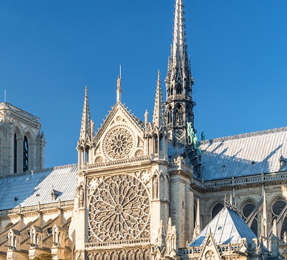 Notre Dame Cathedral facade with intricate rose window, Paris.