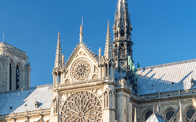 Notre Dame Cathedral facade with intricate rose window, Paris.