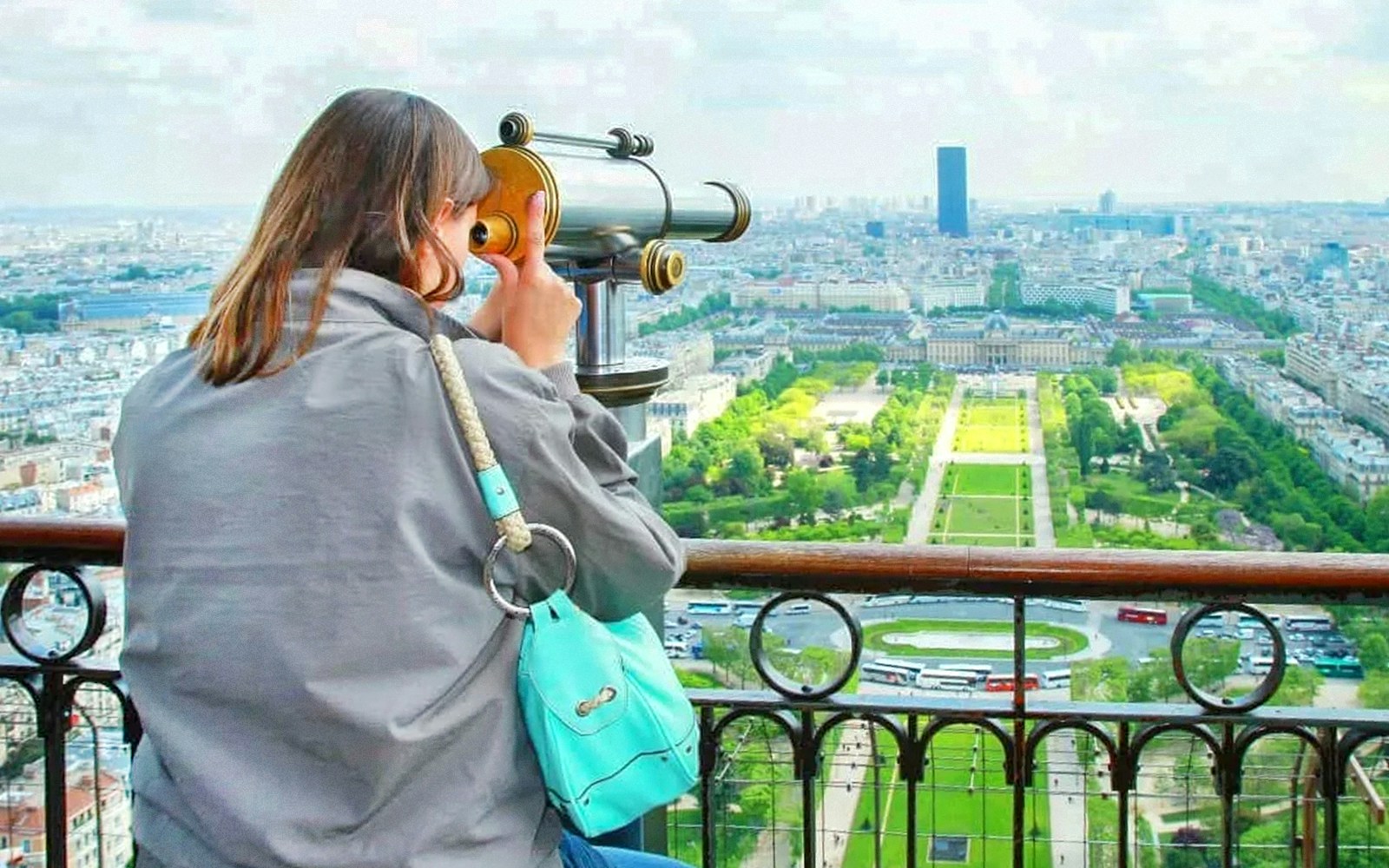 Tourists viewing Trocadero from Eiffel Tower during Royal Combo tour in Paris.