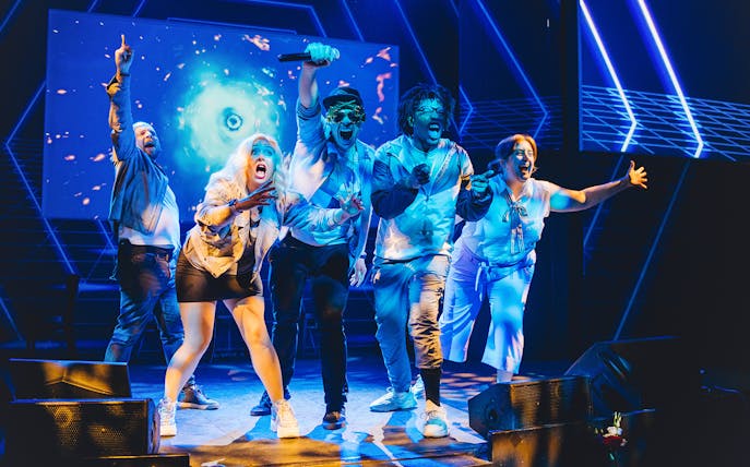 Performers on stage at Boom Chicago Improv Comedy Show in Amsterdam.