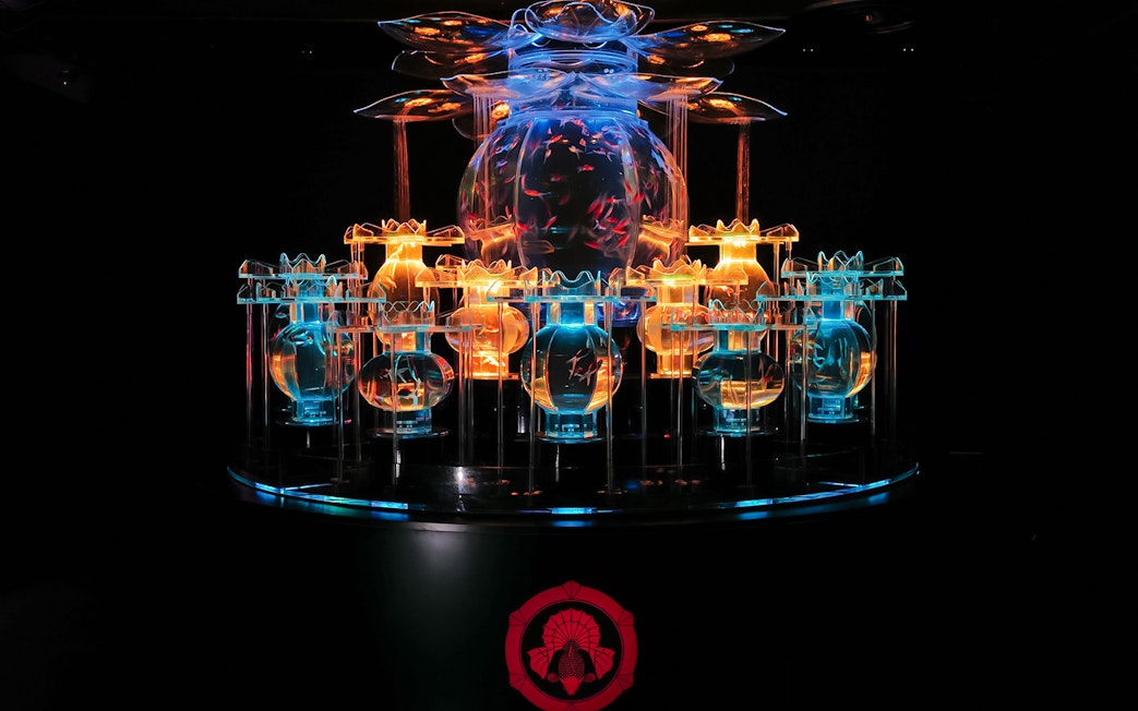 Illuminated flower-shaped goldfish aquarium at Art Aquarium Museum GINZA.