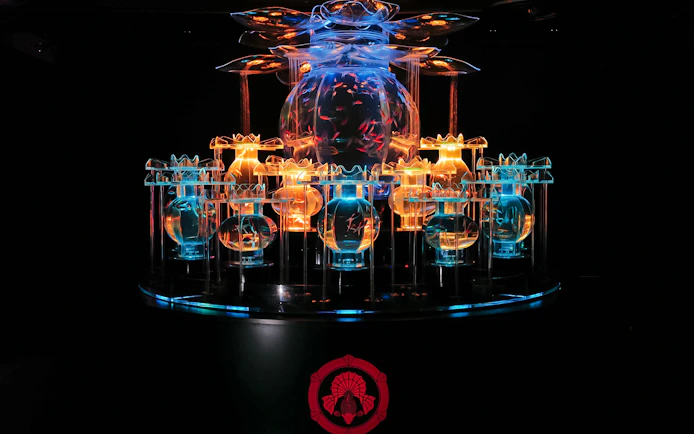 Illuminated flower-shaped goldfish aquarium at Art Aquarium Museum GINZA.