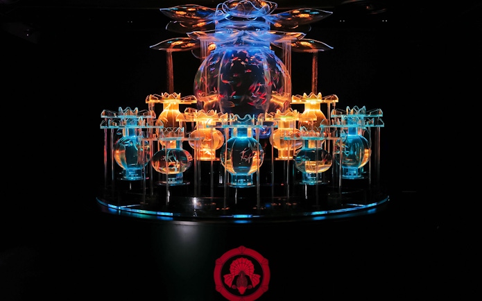 Illuminated flower-shaped goldfish aquarium at Art Aquarium Museum GINZA.