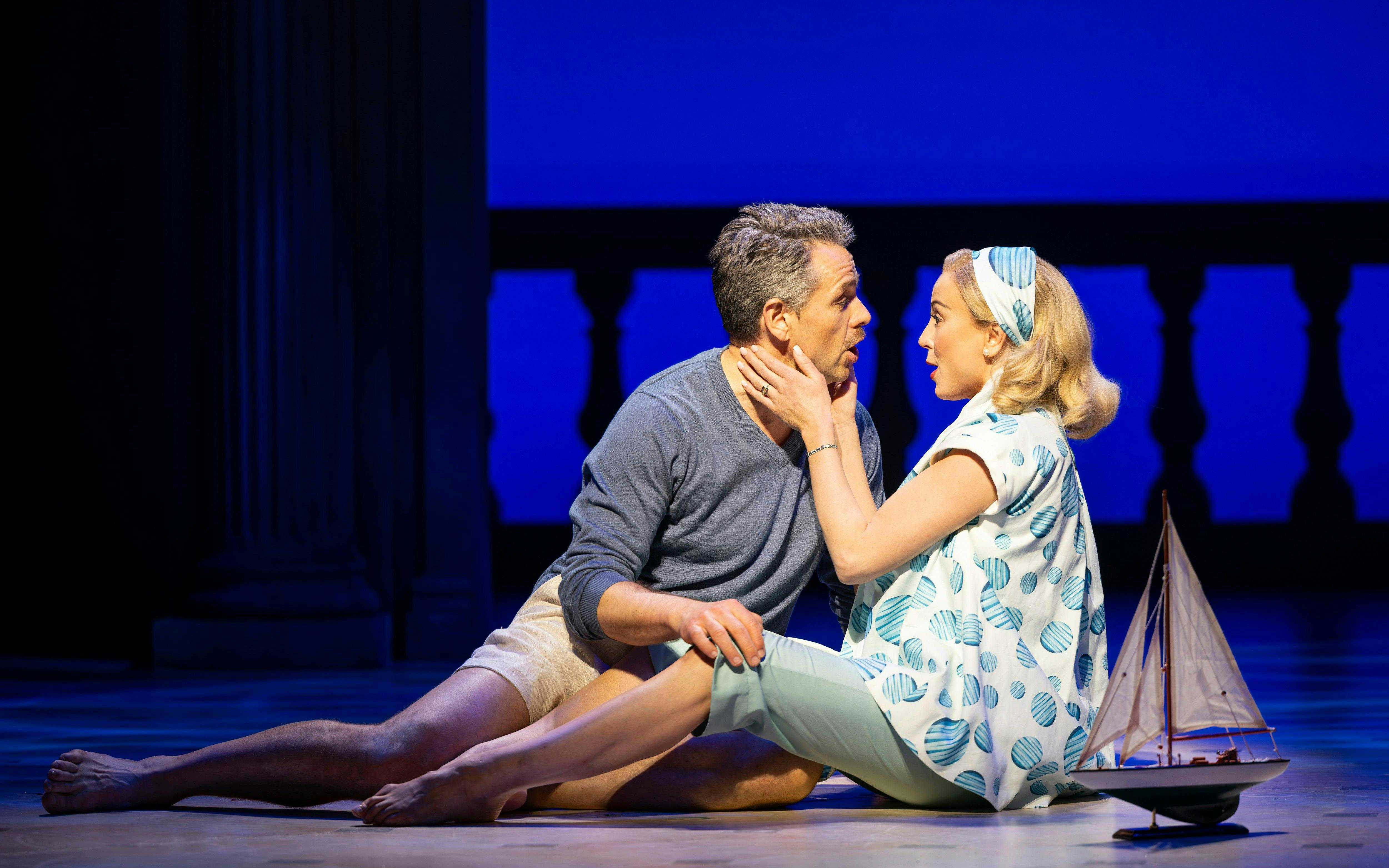 Stage scene from High Society in Westend with actors in an emotional moment.