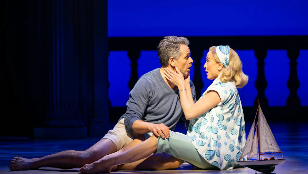 Stage scene from High Society in Westend with actors in an emotional moment.