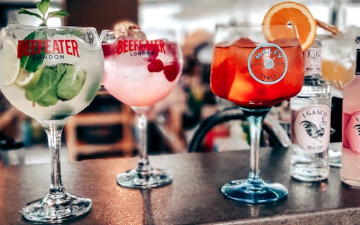 Cocktails on a bar counter during Budapest sunset cruise on the Danube.
