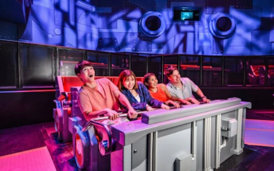 Visitors enjoying a thrilling ride at Universal Studios Singapore.