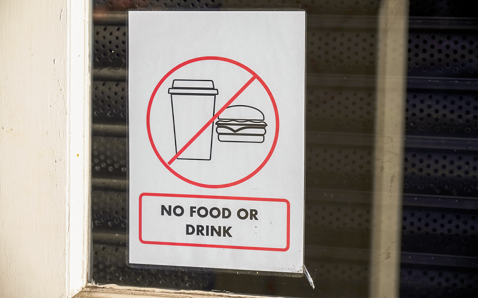 No food or drink sign at St. Peter's Basilica entrance.