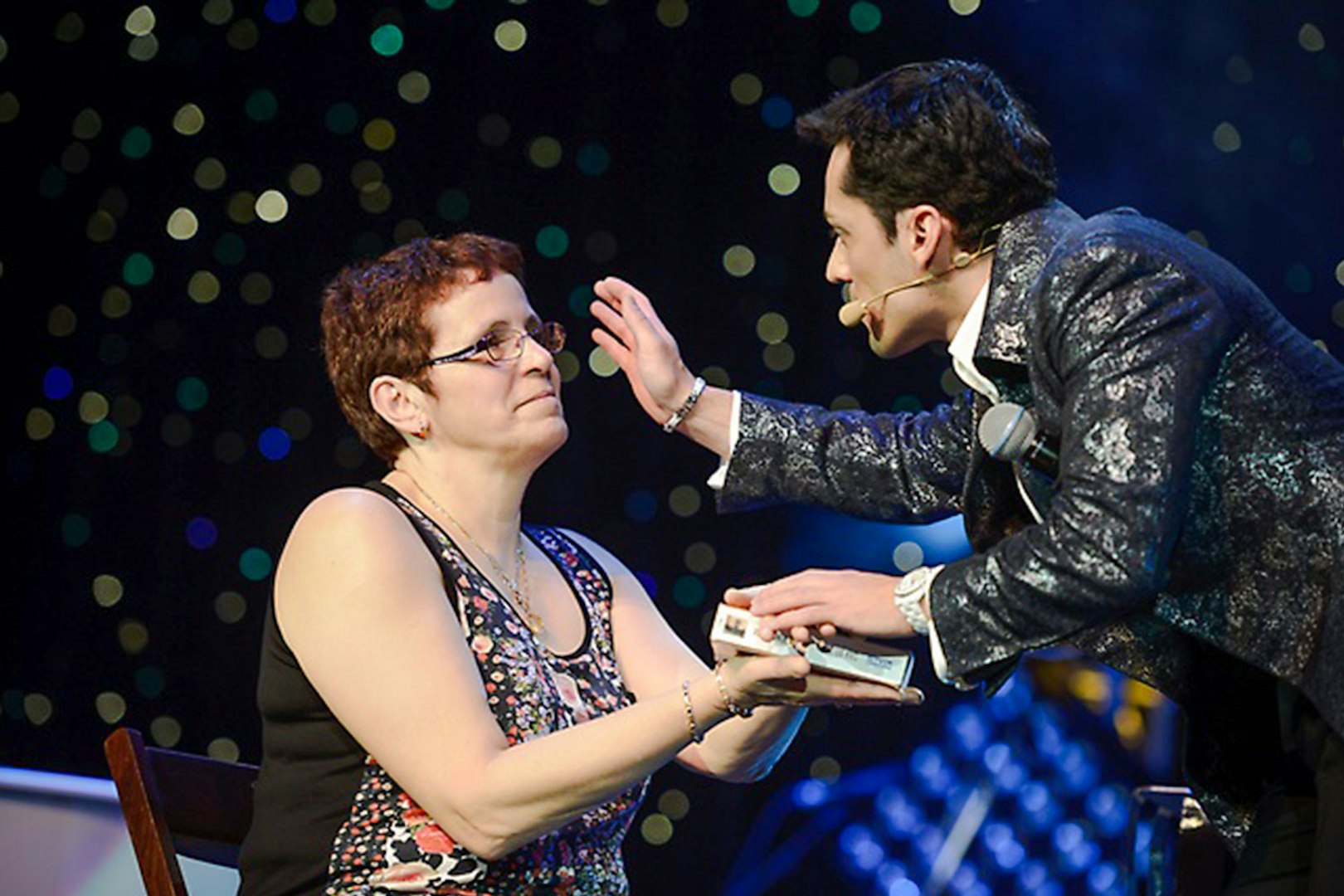 Performer interacting with audience member at PARANORMAL featuring Frederick Da Silva Vegas show.