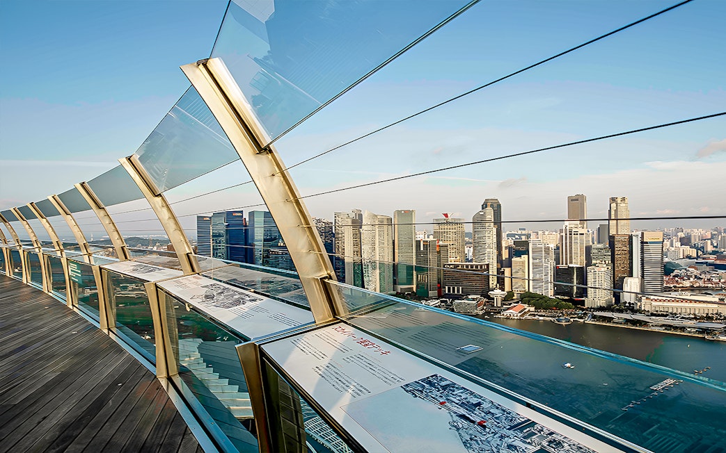 Marina Bay Sands SkyPark Observation Deck overlooking Singapore skyline.