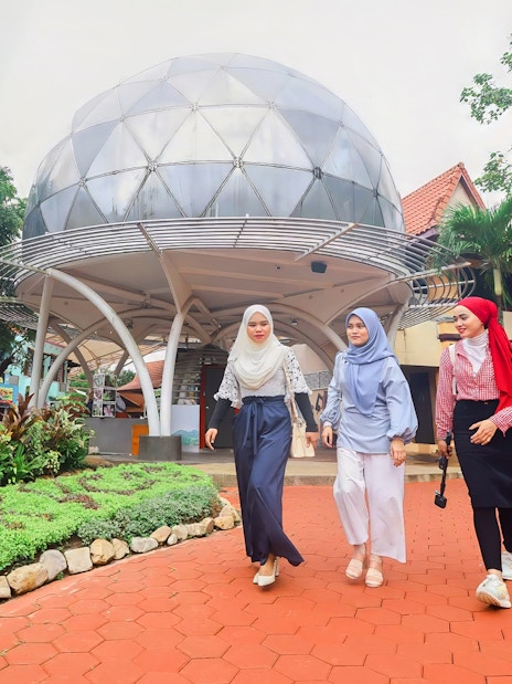 Women walking in front of Skydome Langkawi, Malaysia.