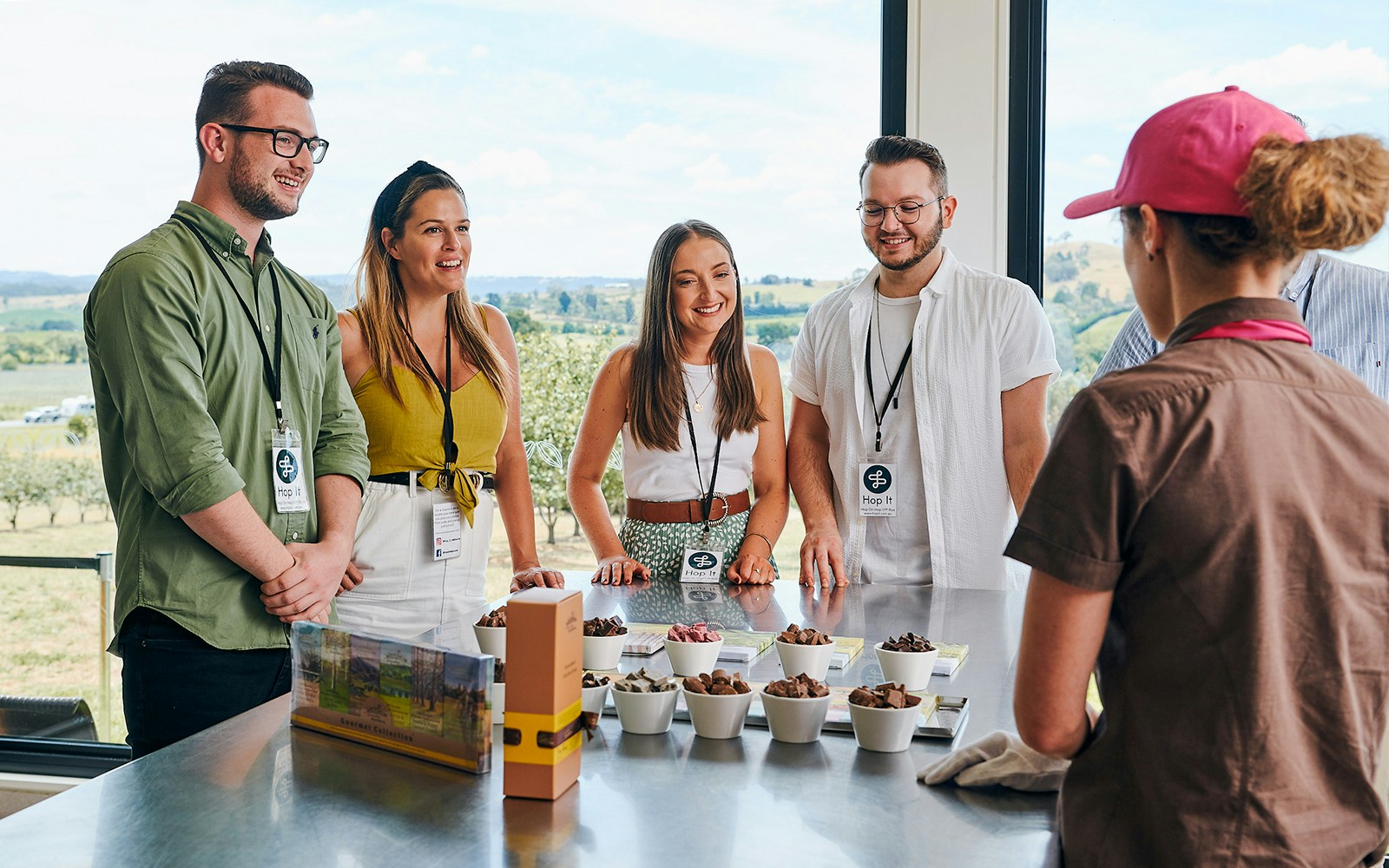 Tourists at Yarra Valley winery learning about chocolate made with alcohol.