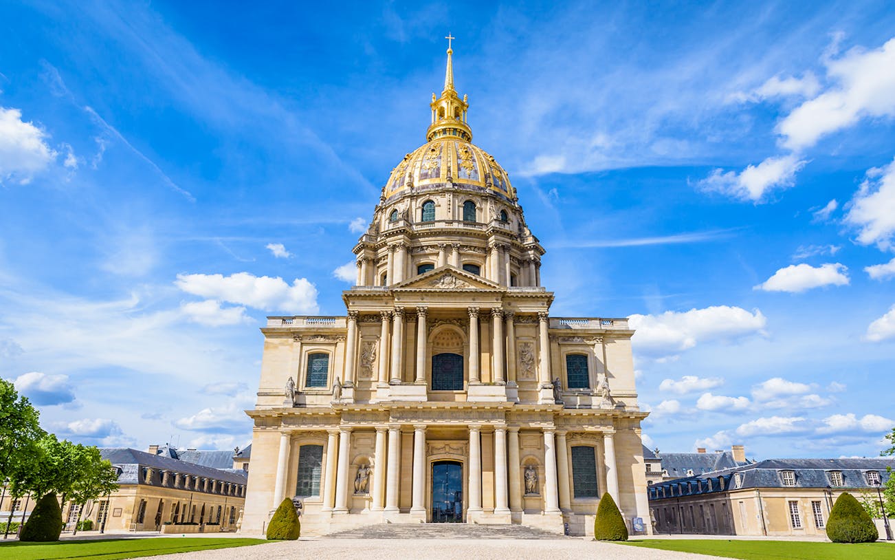 Dome des Invalides in Paris with golden dome and historic architecture.