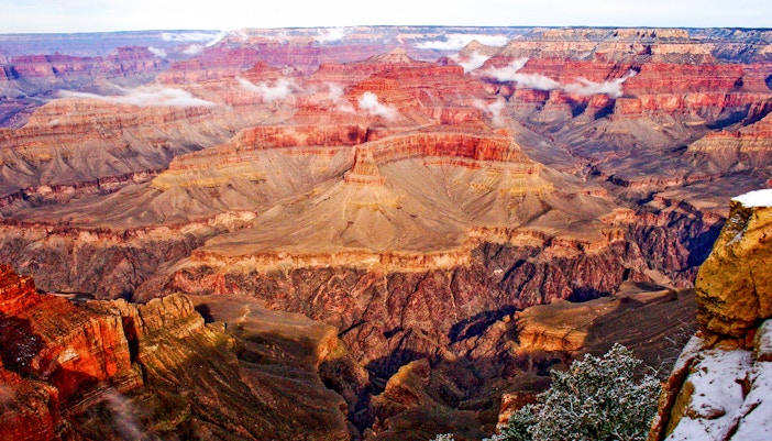 Grand Canyon Yavapai Point with snow-covered landscape on a clear morning.