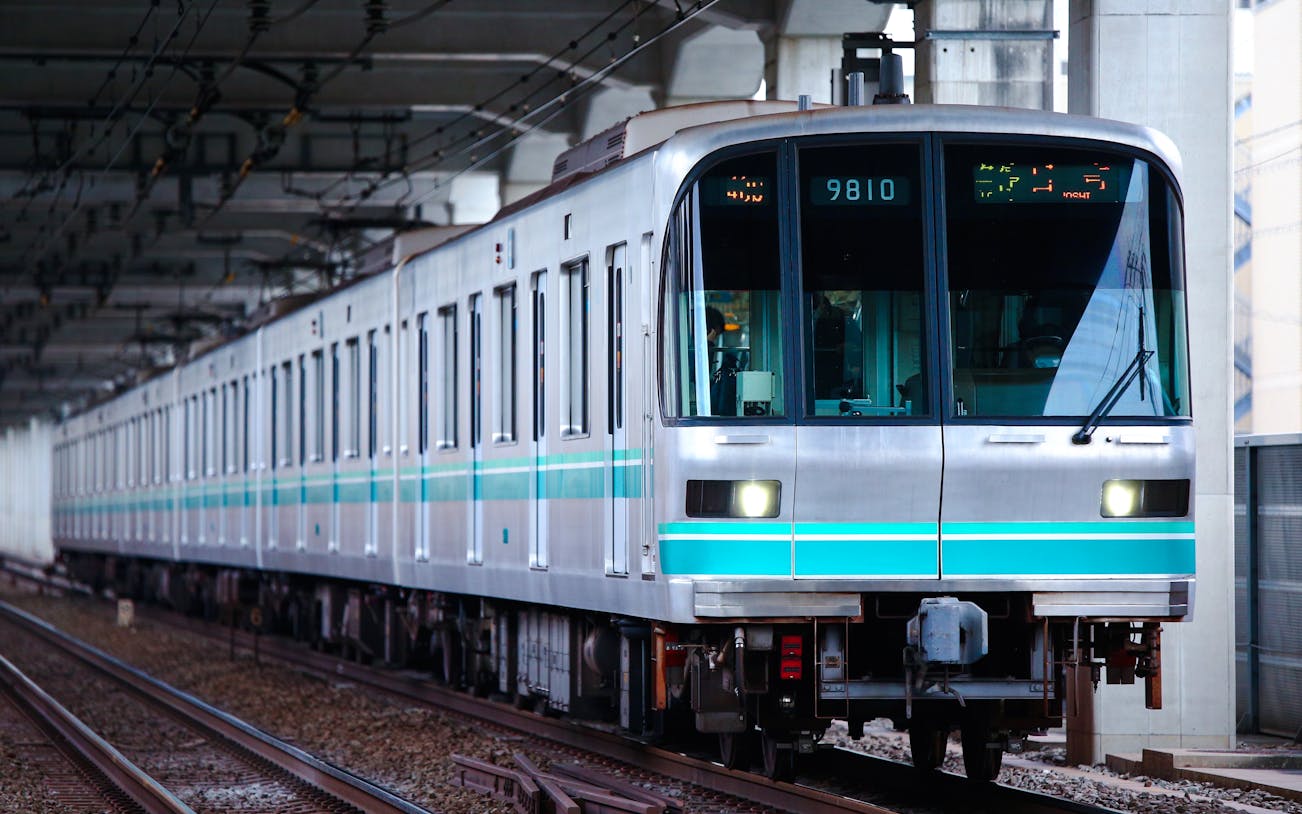 Namboku Line 9000 series train approaching Nakano station in Tokyo.