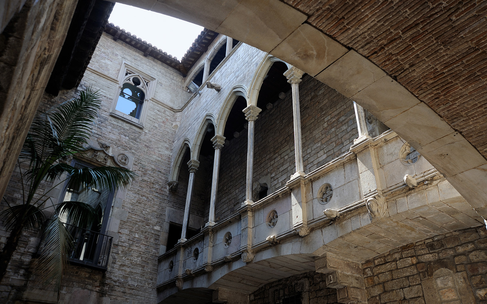 Stone courtyard arches at Picasso Museum, Barcelona.