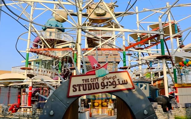 City Studio entrance at Angry Birds World Theme Park with colorful structures and rides.