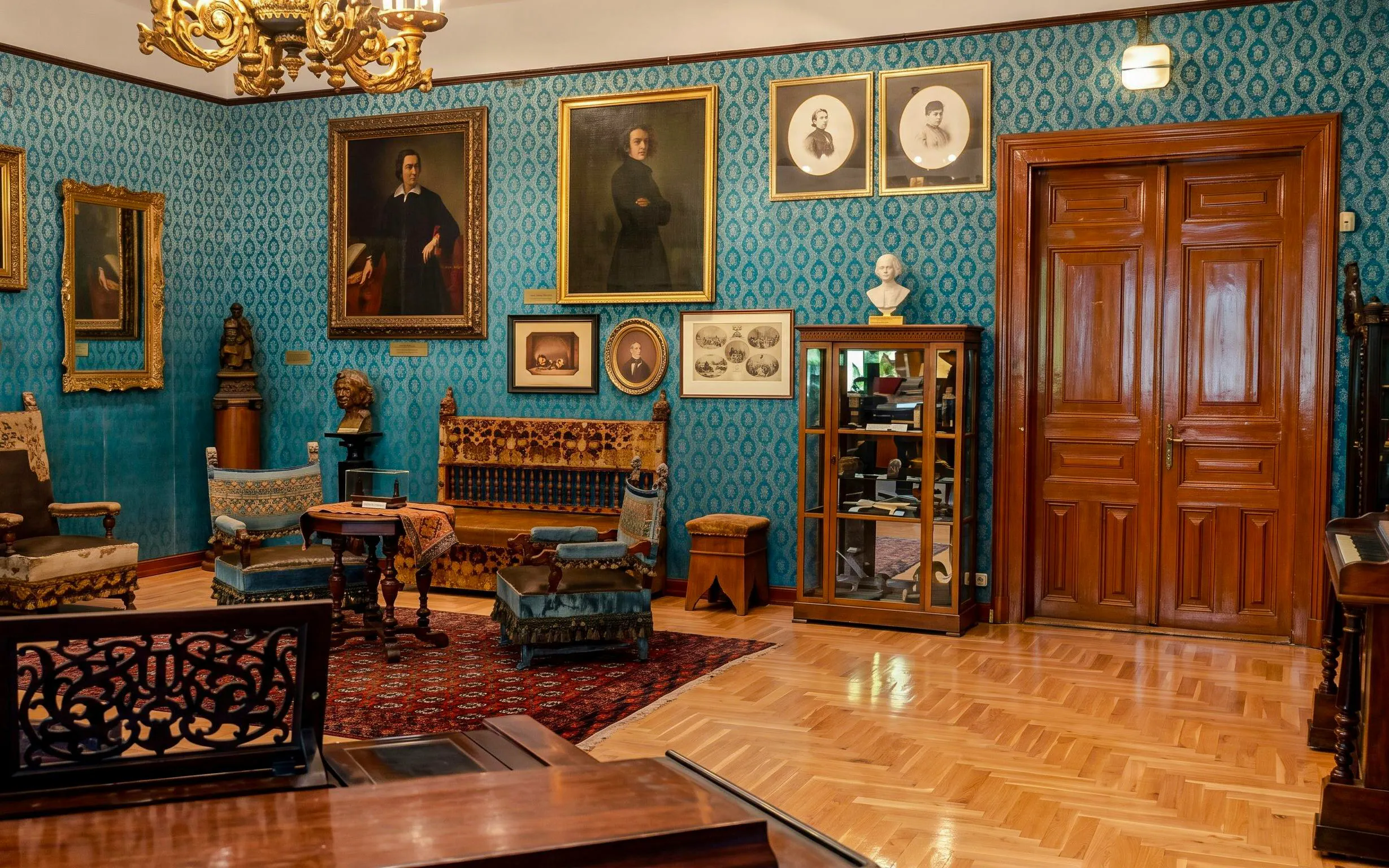 Franz Liszt House Museum interior with portraits and antique furniture in Budapest.