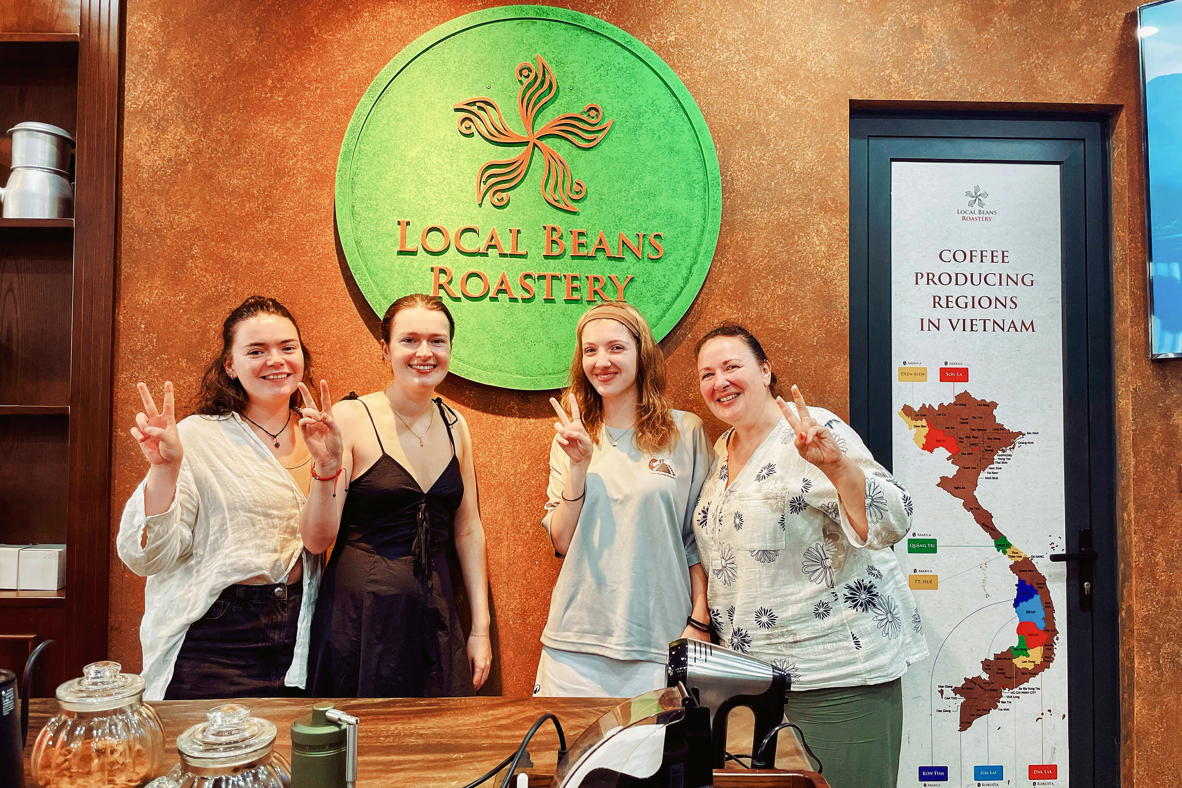 Visitors at Local Beans Roastery in Hanoi, Vietnam, during a coffee workshop.