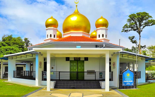 Penang Hill Mosque with golden domes near the funicular train station.