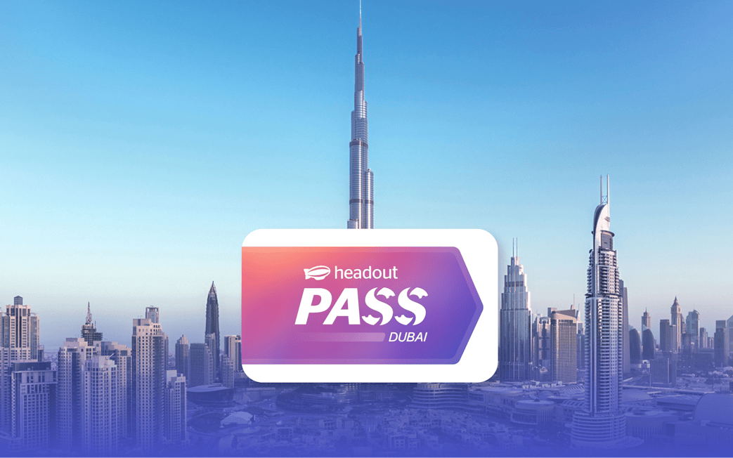 Burj Khalifa towering over Dubai skyline with Headout Pass logo in foreground.