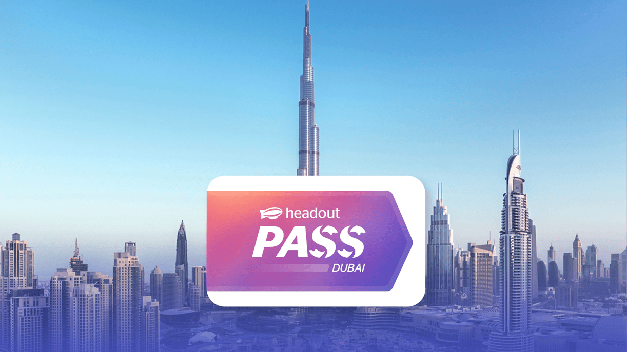 Burj Khalifa towering over Dubai skyline with Headout Pass logo in foreground.