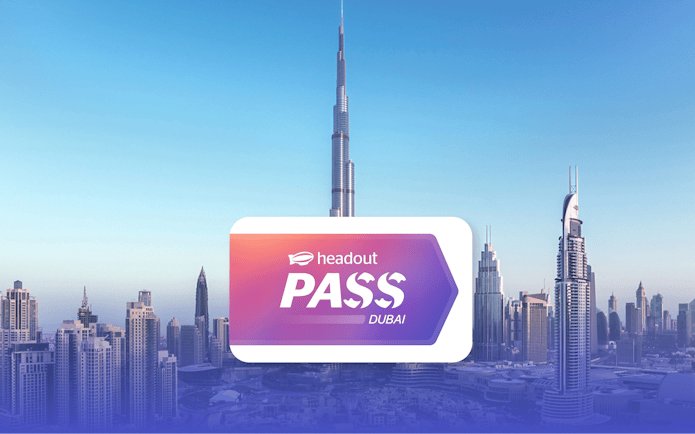 Burj Khalifa towering over Dubai skyline with Headout Pass logo in foreground.