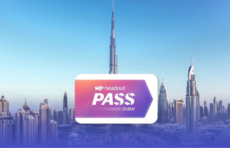 Burj Khalifa towering over Dubai skyline with Headout Pass logo in foreground.