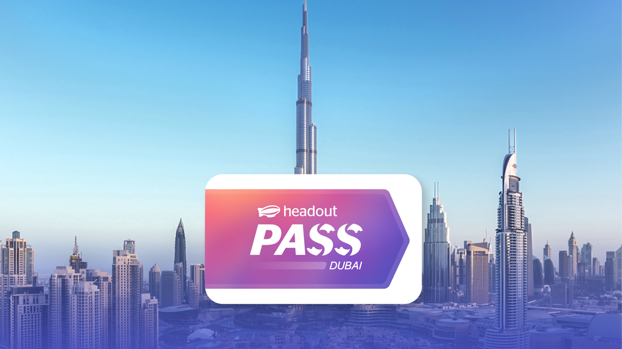 Burj Khalifa towering over Dubai skyline with Headout Pass logo in foreground.