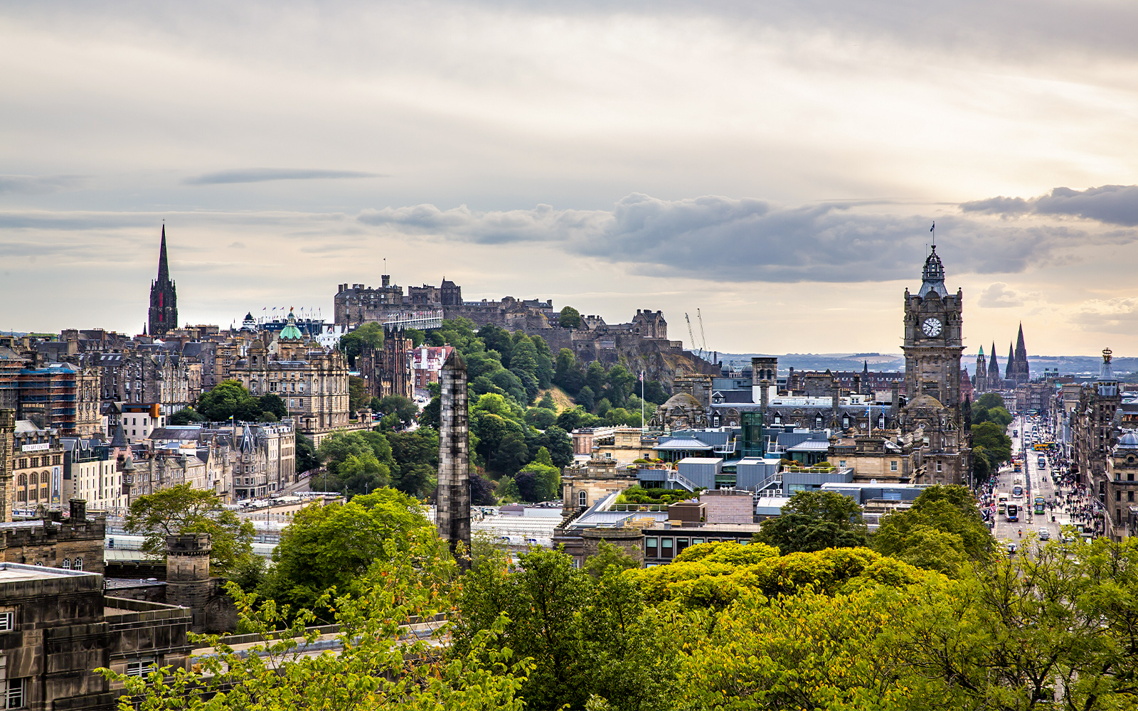 Aerial view of Edinburgh featuring Edinburgh Castle and the Balmoral Clock Tower.