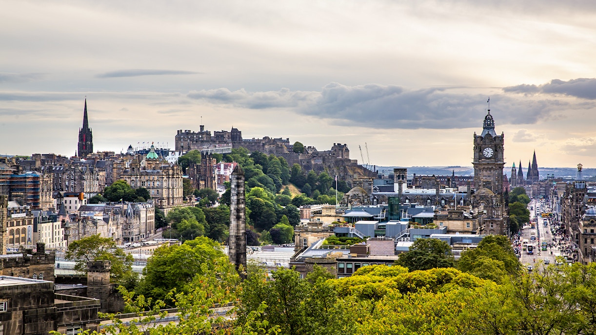 Aerial view of Edinburgh featuring Edinburgh Castle and the Balmoral Clock Tower.